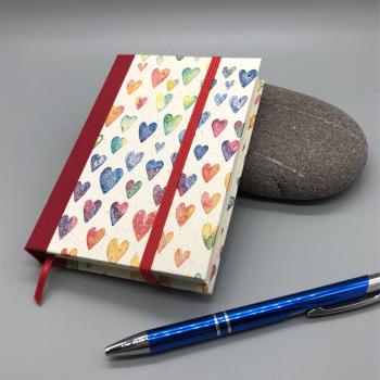Buch Leinenrücken handgebunden Herzen bunt Deko